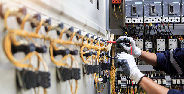 Professional Electrician technician working in Buna, TX